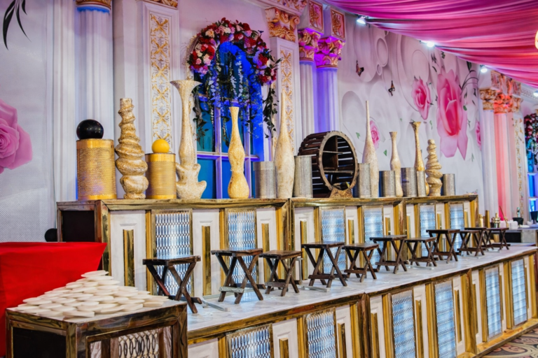 A beautifully decorated traditional food service setup with classic presentation and seating, highlighting the flavours and style of a traditional wedding menu Kerala.