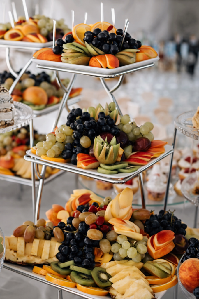 A premium fruit and dessert counter with elegant presentation and variety, offering insight into quality standards when learning how to choose a caterer in Kerala.